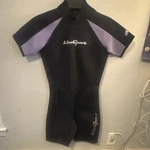 Neo Sport Women's Short Sleeve Wetsuit 2MM Black Purple Size 6. Fixed Price $35.75.
