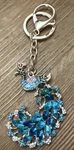 Beautiful Peacock With Gold Aqua Marine And Pink Rhinestone Accents Key Chain. Fixed Price $13.00.