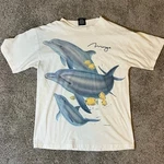 Dolphin Retro Graphic Tee Unisex Short Sleeve Shirt S-5XL. Fixed Price $22.99.
