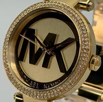 Michael Kors MK5784 Parker Gold Logo Crystal Pave Women's Watch. Fixed Price $102.89.